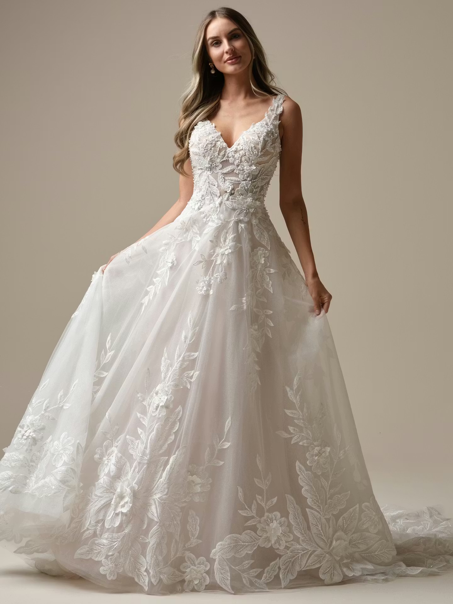 Bride in a floral lace A-line gown